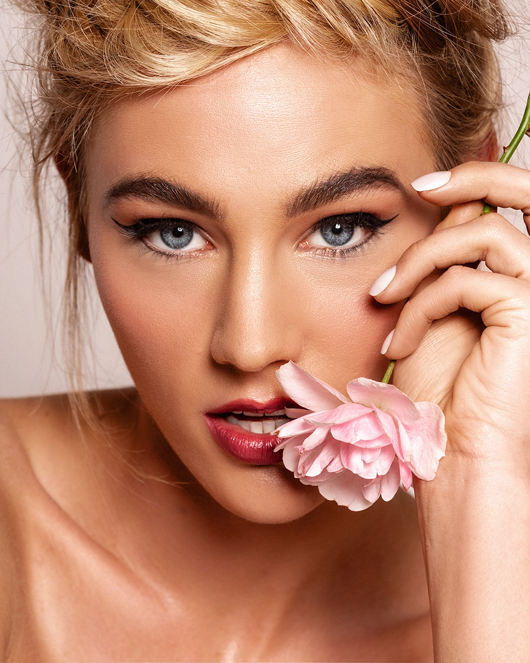 Minimal retouch look — natural features and soft lighting preserved