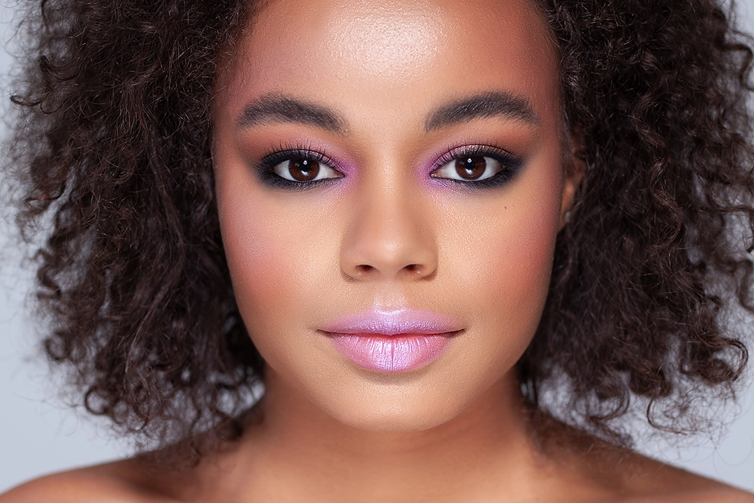 Clean fashion retouch with preserved skin detail and warm toning