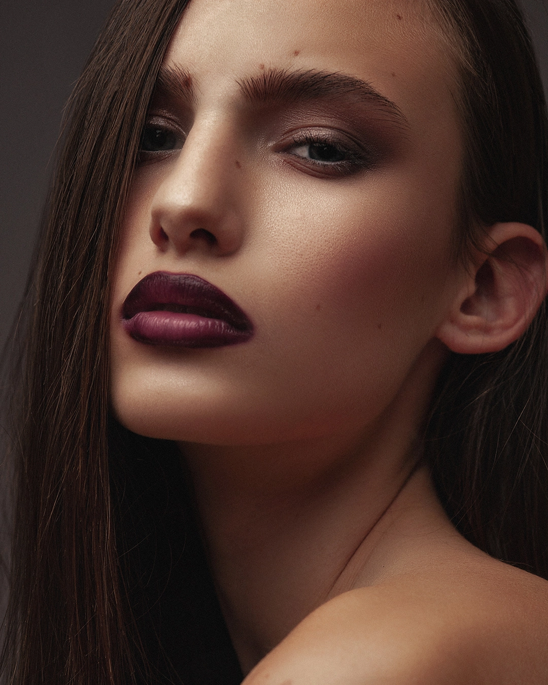 Beauty portrait with soft natural retouching and warm skin tone